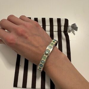 Henri Bendel Silver Clasp Bracelet with Blue-Green Gem Accents